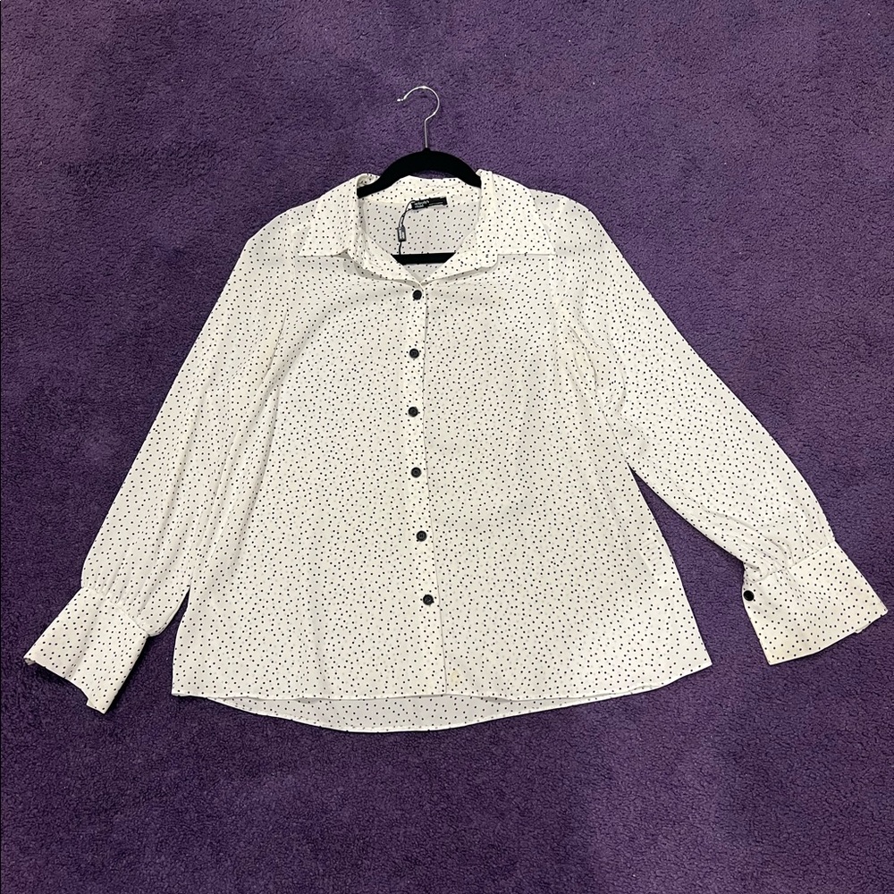 White button down with black polka dots. Size small.